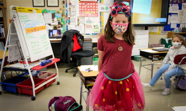 Girl is dressed as a book character